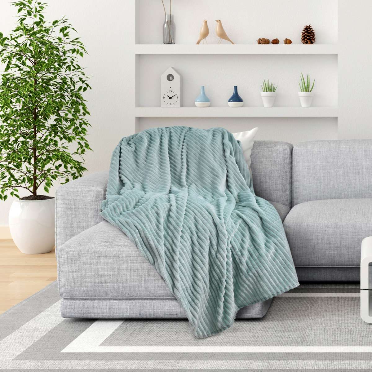 cobija azul aqua sillon